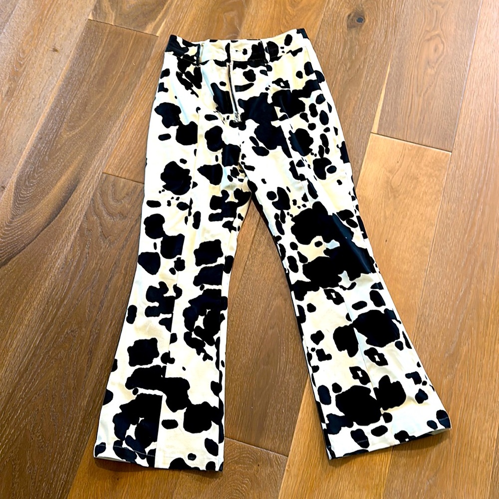 Cow print, size small, flare bottom, Anthropologie pants.